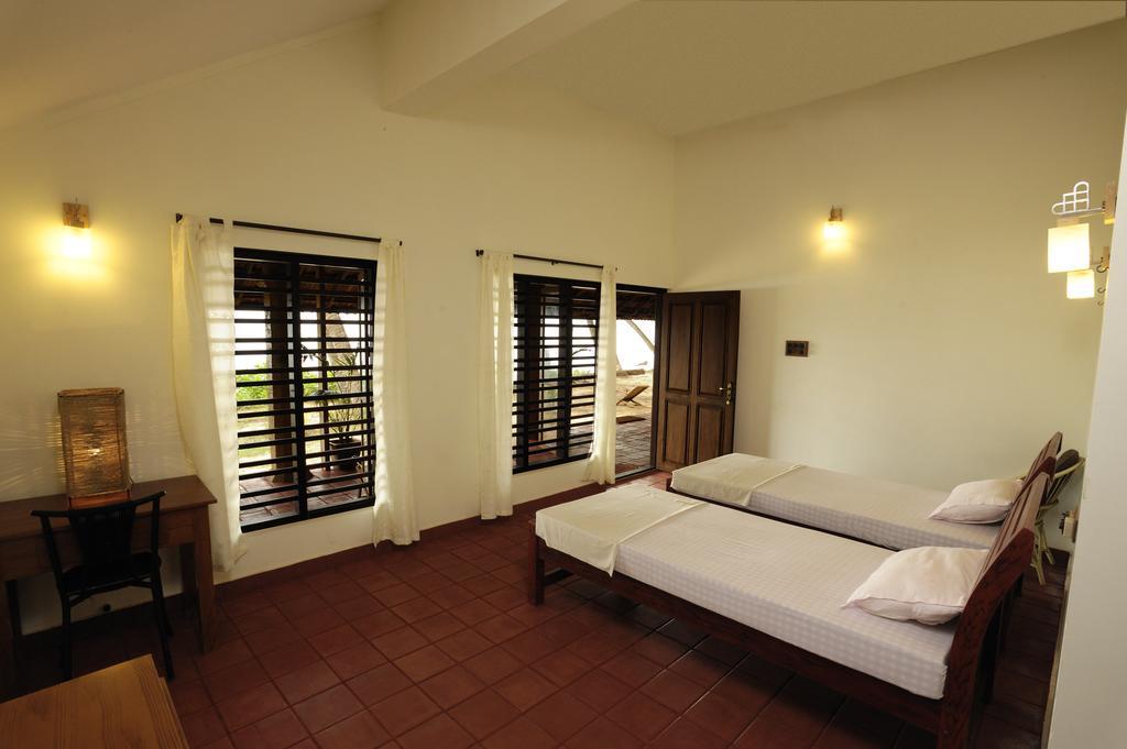 Отель Chera Rocks Beach House Thottada Номер фото